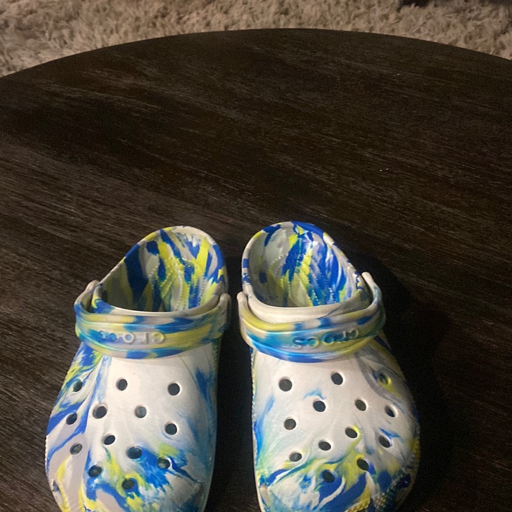 Crocs that are blue and yellow